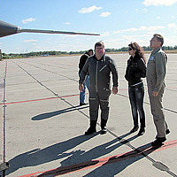 Tony with Sokol Test Pilot Sergey Kara and incredible airbase guide Irina on a pre-flight check of the MiG-29.