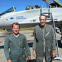 Jeremy and his pilot, Yuri Polyakov, stop for a photo in front of the legendary MiG-29. Jeremy is 6'4