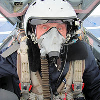 Pat is strapped into the MiG-29 and ready for take-off. A heavy flight jacket, provided by Sokol airbase, is required for flights in cold weather