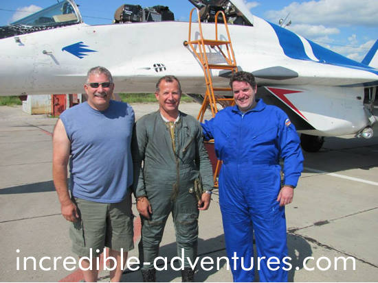 Brothers Doug and John pose in front of the MiG-29 with Sokol Test Pilot Yuri Polyakov. They flew in July 2014.
