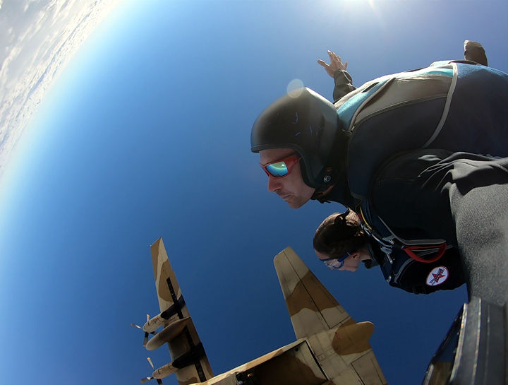 Rebecca Claxton and Ryan Jackson skydive over the Great Pyramids at Giza in Egypt