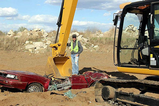 Drive an excavator and crush a car