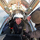 Bryan is strapped into the MiG-29 by a member of the Sokol Airbase ground crew. Bryan traveled from England to experience an incredible fighter jet flight.