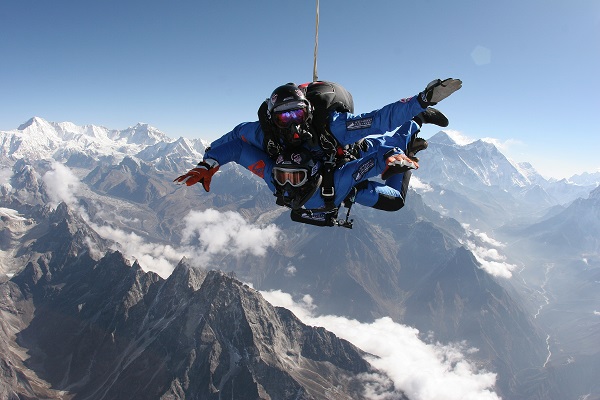 Tandem skydivers over Mt Everest