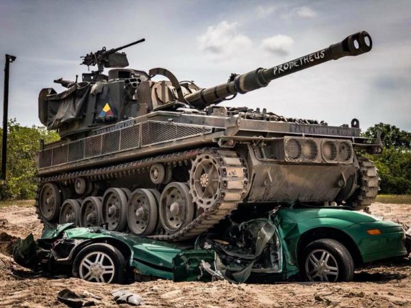 Tank crushing a car